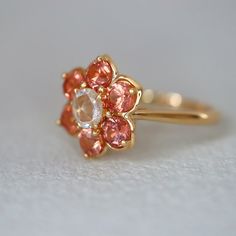 Sunset Color Halo Ring With Rose Cut Sapphire Daisyring Gift for Her Precicion Cut Gems. 14K Yellow Gold US7.25. RTS - Etsy Coloured Engagement Rings Vintage, Pink 14k Stamped Wedding Jewelry, Pink 14k Stamped Jewelry For Wedding, Rose Gold Hallmarked Flower Ring For Wedding, Pink 14k Gold Flower Ring For Wedding, Sunset Color, Colored Engagement Rings, Daisy Ring, Claddagh Rings