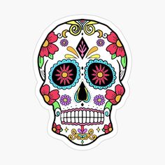 a colorful sugar skull with flowers on it