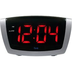 an alarm clock with red numbers on it