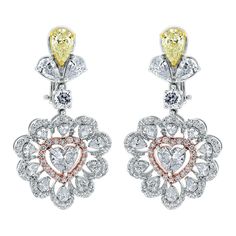 Beauvince Yellow And White Diamond Heart Drop Earrings In White Gold Luxury Diamond Cut Heart Earrings, Luxury Brilliant Cut Heart Earrings, White Luxury Earrings For Valentine's Day, Luxury Heart-shaped Diamond Earrings, Luxury White Heart Earrings For Formal Occasions, Elegant Multicolor Earrings For Valentine's Day, Luxury Diamond Earrings For Valentine's Day, Luxury White Heart Earrings, Luxury Heart-shaped Drop Earrings For Anniversary