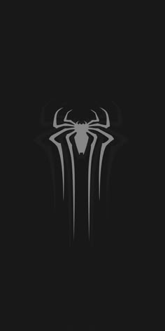 the spider - man logo is shown in black and white, with horns on it