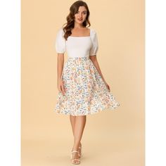 Made of floral-printed fabric, this midi skirt is high-waisted featuring an A-line silhouette. This flowy midi skirt with a tiered design and vintage allover floral prints. Featuring an A-line and tiered details, it is a summer casual skirt to be paired well with a top and sandals for a cute day look and with a stylish T-shirt and vintage high heels for a charming inspired look. Casual Summer Skirt, Midi Skirt White, Vintage High Heels, Button Front Skirt, Ruffle Fabric, Floral Midi Skirt, Floral Print Skirt, Skirt White, Women's Skirts