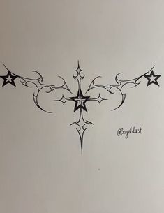 an artistic tattoo design with stars on it