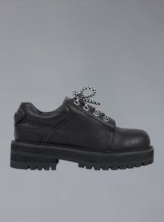 The Zoe Shoe has all the toughness of a work boot, but requires, nor expects ANY work to be done in them whatsoever. All leather upper with padding at the ankle and tongue, a rounded toe, branded rubber UNIF patch at the back, and two sets of laces, one black, and one black/white pattern. The sole is a durable rubber stacked from 1" at the front to 1.5" at the heel. Click Here for a printable size chart (make sure you print at Actual Size to ensure accuracy) For any questions about sizing please