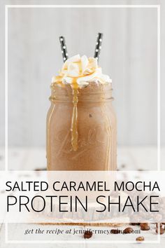 salted caramel mocha protein shake in a mason jar with whipped cream on top