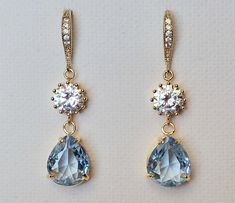 Wedding Sky Blue Steel Light Blue Crystal Cubic Zirconia Gold Teardrop Dangle Chandelier Bridal Earrings. PLEASE READ ITEM DESCRIPTION and SHOP POLICIES before placing your order, and contact me with any questions! EARRINGS are about 1.53 inch (3.9cm) long from top of ear wire to bottom. BRIDAL EARRINGS SECTION: https://www.etsy.com/shop/LanaChayka?ref=seller-platform-mcnav§ion_id=11638940 BRIDAL JEWELRY SETS SECTION: https://www.etsy.com/shop/LanaChayka?ref=seller-platform-mcnav§ion_id=25839214 BRIDAL NECKLACES SECTION: https://www.etsy.com/shop/LanaChayka?ref=seller-platform-mcnav§ion_id=11638944 Elegant and timeless, these gorgeous earrings are perfect for weddings or special occasions such as birthdays, anniversaries, graduations, proms...or whatever you can imagine! Handmade earrings, Blue Dangle Chandelier Earrings For Anniversary, Blue Chandelier Drop Earrings For Anniversary, Blue Long Drop Earrings For Wedding, Blue Long Drop Jewelry For Wedding, Elegant Blue Chandelier Earrings For Wedding, Blue Long Drop Wedding Jewelry, Blue Teardrop Chandelier Earrings For Anniversary, Blue Drop Bridal Earrings, Blue Drop Bridal Earrings For Wedding