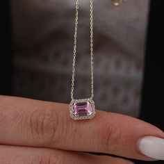 The "14K Gold Emerald Cut Pink Tourmaline Necklace" is a breathtaking piece of jewelry that radiates beauty and elegance. Adorned with a delicate pink emerald halo, this necklace exudes charm and sophistication. Perfect for Mother's Day or as a wedding gift, it symbolizes love, compassion, and femininity. With its dainty design and genuine 14K gold construction, this necklace is sure to be treasured as a timeless and meaningful accessory. Pendant Width: 0.37 inches / 9.40 mm Pendant Height: 0.30 Exquisite Pink Gemstone Necklaces, Exquisite Pink Gemstone Necklace, Wedding Diamond Necklace With Ethical Diamonds, Exquisite Birthstone Necklace For Wedding, White Gold Diamond Necklace With Birthstone For Wedding, Exquisite Wedding Necklace With Birthstone, Diamond Birthstone Necklaces For Wedding, Pink Birthstone Necklaces For Wedding, 14k Gold Pink Necklaces For Wedding