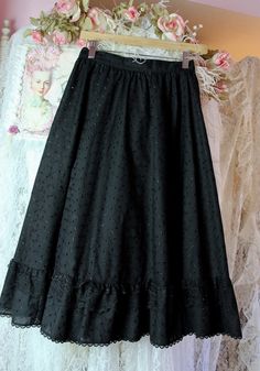 "Pre Loved Great Condition No Stains, Rips or Snags Almost New Vintage 70s 80s Brand: Gunne Sax by Jessica McClintock Black Floral Embroidery Eyelet, Ruffled Lace Skirt Edwardian/Goth/ Style Midi Skirt Back Zipper Closure with one Top Button Material: Polyester Cotton Blend/Nylon No Inside Lining Ruffled Lace & Lace Trims of Bottom Hemline Size Approx. X-Small Check the Measurements Below Measured Laying Flat Waist: 25\" Around Hips: 40\" Around Length: 29\" Shipping from 3-5 Days No Returns or Vintage Party Petticoat With Ruffled Skirt, Black Vintage Ruffled Skirt, Spring Party Skirt With Can-can Detail, Spring Party Skirt With Can-can, Vintage Ruffled Skirt For Party, Vintage Party Skirt With Attached Cancan, Vintage Black Petticoat, Black Vintage Tiered Skirt, Vintage Black Skirt For Summer