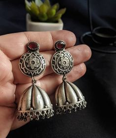 Add charm and charisma to your beautiful personality with these exquisitely designed and handcrafted high quality stone studded silver look alike jhumkas. Pair them up with any formal or semi formal attire and gather compliments wherever you go. Suitable for both casual and dressy occasions. Colour: Antique Length 5 cm Each earring weighs 16 gms (light weight) Note: All in stock items will be shipped from New Delhi, India within 2-3 business days after receipt of payment. International orders ma Beautiful Personality, Semi Formal Attire, Traditional Indian Jewellery, New Delhi India, Wedding Order, Statement Choker, Stone Studs, Jewelry Choker, German Silver