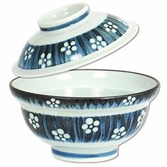 a blue and white bowl with paw prints on it