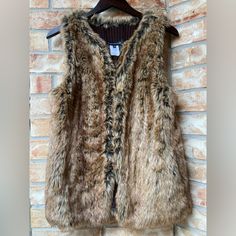 Jones New York Faux Fur Vest Jacket/ Size Small 75% Acrylic 25% Polyester New With Out Tags / Never Worn See Pics For Details On Condition Brown Fur Coat With Faux Fur Lining For Spring, Brown Faux Fur Outerwear For Spring, Spring Brown Fur Coat With Faux Fur Lining, Brown Faux Fur Lined Coat For Spring, Spring Brown Faux Fur Outerwear, Casual Brown Fur Coat With Faux Fur Lining, Faux Fur Vest, Faux Fur Vests, Fur Vest