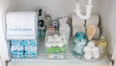 the bathroom is organized and ready to be used as a storage area for personal care items