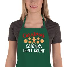 PRICES MAY VARY. Cotton & Polyester Imported SPECIALLY DESIGNED FOR CHRISTMAS - Looking for something special to bake for the incoming holiday season? This CUTE Christmas Kitchen baking apron will definitely say YES. Start thinking about the holiday season early with this unique Christmas kitchen baking helper, and Celebrate the holiday in style with this one designed to get you into the Christmas spirit! CUTE & PRACTICAL DESIGN - Christmas Calories Don't Count! Features the cutest holiday words Grinch Apron Christmas, Christmas Aprons Vinyl, Grinch Home Depot Apron, Holiday Aprons For Adults, Christmas Baking Crew Apron, Christmas Gift Themes, Christmas Calories Don't Count, Cooking Aprons, Baking Humor