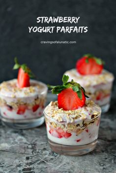 strawberries and yogurt parfaits in small glass dishes