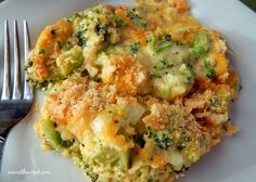 broccoli and cheese casserole on a white plate