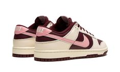 The Nike Dunk Low Premium “Valentine’s Day 2023” is a festive colorway of the retro basketball shoe that celebrates the Lover’s Holiday.  The “Valentine’s Day” Dunk Low is the 2023 version of the popular theme that shows love, no pun intended, to Valentine’s Day.  This time around, the shoe features a two-tone, maroon and Pale Ivory color combination.  Specifically, maroon leather appears on the base while Pale Ivory leather overlays.  A pink tumbled leather Swoosh is found on either side of the 2023 Shoes, Sneaker Displays, Kobe Shoes, Retro Basketball Shoes, Retro Basketball, Womens Basketball Shoes, Kicks Shoes, Maroon Leather, Cute Nike Shoes