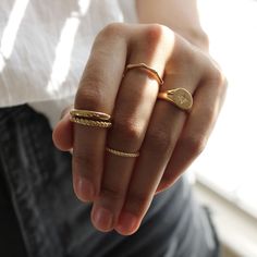 Super cute, minimal gold filled roped stacking ring. This ring features a delicate 1mm twisted band. It is water friendly but note- it is dainty and meant to pair with others for added durability. Available in whole sizes 5-9. Materials: 14k Gold Filled Band Width: 1mm Hypoallergenic. Nickel and lead free. What does Gold-Filled mean? Gold filled jewelry contains 1/20th (5%) of real gold content, or more than 100x real gold content that most gold plated jewelry. The process to make gold-filled je Gold Rings Classy, Dainty Everyday Initial Ring, Tarnish Resistant, Dainty Everyday Tarnish Resistant Initial Ring, Dainty Everyday Initial Ring Tarnish Resistant, Simple Tarnish Resistant Midi Rings For Everyday, Simple Tarnish-resistant Midi Rings For Everyday, Simple Everyday Tarnish Resistant Midi Rings, Minimalist Twisted Gold Rings, Minimalist Twisted Rings For Everyday