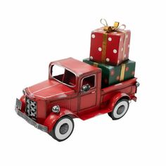 a red truck with presents on the back