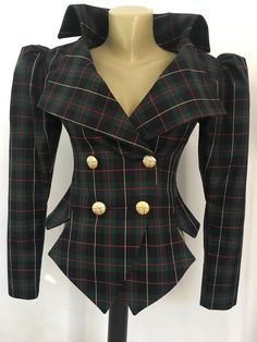 This is a very stylish and elegant jacket . Leght  58cm - at back. Fully lined. A jacket especially made to turn heads and give you that wow factor :) Vintage style leg o mutton sleeves.SIZE CHARTSIZE S - US 6, UK 8, EU 36bust: bust around 34.5”/90cmWaist: waist around 27.5”/70cmHips: hips around 34.5”/90cmSIZE M - US 8, UK 10, EU 38bust: bust around 37.5”/95cmWaist: waist around 29.5”/75cmHips: hips around 37.5”/95cmSIZE L - US 10, UK 12, EU 40bust: bust around 39.5"/100cmWaist: waist around 31 Elegant Double-breasted Plaid Blazer, Chic Double-breasted Plaid Blazer, Plaid Blazer With Buttons For Office, Winter Plaid Blazer With Buttons, Plaid Long Sleeve Office Blazer, Plaid Office Blazer With Buttons, Elegant Plaid Outerwear With Buttons, Fitted Plaid Outerwear With Buttons, Elegant Plaid Blazer With Buttons