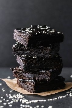 chocolate brownies stacked on top of each other