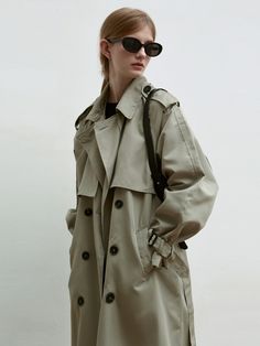 Editor's notesWhether the elements with this double-breasted trench featuring our iconic turn-lock hardware for a heritage touch. Crafted in a sturdy poly blend, the transitional, belted silhouette is finished belting at the sleeves.- Oversized collar- Front and back panel- Double-breasted button closure- Deep back vent- Maxi long trench coat- Angled side pocketsMeasurements(in.)- Size: One size(XS-M)- Chest: 23.62in- Sleeve: 27.56in- Length: 45.28in- Model Info: 5' 7 / BUst 32.28in / Waist 23.6 Classic Khaki Outerwear With Belted Cuffs, Classic Khaki Belted Outerwear, Spring Gabardine Outerwear With Belt Loops, Belted Khaki Outerwear For Business, Classic Khaki Outerwear With Double-breasted Button, Classic Khaki Double-breasted Outerwear, Classic Beige Outerwear With Belt Loops, Workwear Outerwear With Belt Loops, Khaki Belted Gabardine Outerwear