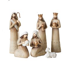 three nativity figurines, one holding a baby jesus and the other holding an infant jesus