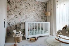 Whimsical Australiana gender neutral nursery Backyard Shipping Container, Green Round Rug, Babies Wallpaper, Feeding Chair, Free Standing Coat Rack, Rattan Floor Lamp, Gender Neutral Nursery Decor, Nursery Style, White Cot