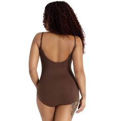 Your collection of dancewear could not be complete without the Camisole Leotard with Adjustable Straps. This best-seller is made of a nylon and spandex combination that is soft and flexible. Adjustable straps ensure a custom fit while the double-stitched seams guarantee long-lasting wear. Offered in multiple colors to match your individualized style. Available in both adult and child sizes. Seamless Stretch One-piece Leotard, Second-skin Camisole Bodysuit With Built-in Bra, Shapewear Leotard With Built-in Bra, Fitted Camisole Leotard With Built-in Bra, Camisole Bodysuit With Lined Body, Lined Bodysuit Camisole, Solid Camisole Bodysuit With Lined Body, Solid One-piece Smoothing Leotard, Smoothing One-piece Leotard