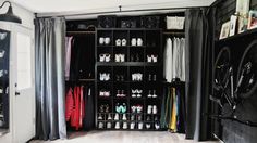 the closet is full of shoes and other things to wear in it's storage area