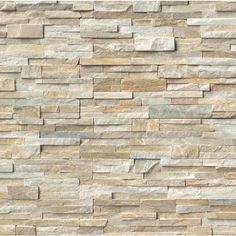 a stone wall that looks like it is made out of different types of stones