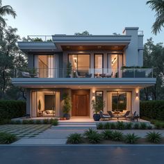 a modern house is lit up at night