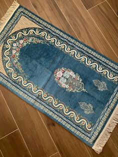 * Introducing our premium prayer rug, exquisitely woven with jacquard and chenille fabrics. This luxury prayer rug features a delicate floral pattern on a soothing blue background, combining sophistication with high-quality workmanship. Perfect for those who appreciate both beauty and comfort in their daily prayers. * This prayer rug is carefully handmade with first-class materials in Turkey. Adorned with beautiful patterns that reflect Islamic culture, each detail of this prayer rug highlights Prayer Mat Islam, Islam Prayer, Muslim Prayer Mat, Islamic Culture, Prayer Mat, Muslim Prayer, Daily Prayers, Saved Pins, Islamic Prayer