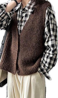 Brown Winter Vest Top, Brown Knit V-neck Vest, Casual Brown Winter Vest, Casual Brown Vest For Winter, Brown Knit Vest For Layering, Casual Brown Vest For Fall, Brown Vest Sweater For Fall, Brown V-neck Sweater Vest For Winter, Brown Knitted Sweater Vest For Winter