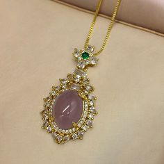 Only One In Stock. Gold Tone Metal. Pink Glass. Clear And Green Cz Stones. Necklace Has A Bolo Adjustment. Longest Length Is 18 Inches Pink Oval Pendant Jewelry For Wedding, Pink Oval Cubic Zirconia Necklaces, Pink Oval Cubic Zirconia Necklace, Pink Rhinestone Pendant Necklace, Elegant Pink Necklace With Sparkling Stones, Pink Rhinestone Pendant Jewelry, Elegant Jeweled Pink Necklace, Elegant Pink Jeweled Necklace, Pink Necklace With Stones