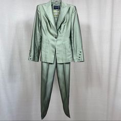 Gorgeous Richard Tyler Vintage Pants Suit. Made In Usa. Size 4 Blazer Is Fully Lined With Two Front Pockets, One Button Closure And 4 Buttons At Cuffs. Beautifully Finished Inside And Out. There Is A Darker Spot On The Collar Left Side, Not Noticeable. Other Than That This Blazer Is Very Clean And In Very Good Condition. Pants Are Altered And In Very Good Condition. Waist 26” Rise 12” Inseam 33.5” Leg Opening 10” Color Is Olive/Green. Pictures Are Part Of The Description. Couture Jackets, Vintage Pants, Blazer Suit, Olive Green, Suit Jacket, Jackets & Coats, Jackets For Women, Blazer, Couture