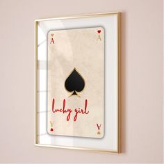 a framed playing card with the words lucky girl on it