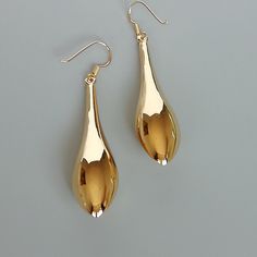 A PAIR of long teardrop bauble. This is a sterling silver earring dipped in gold. Size: Length: 5.3cm Width at widest section: 11 x 13 mm Weight: 7.25 gm Drop length: 6.4 cm These earrings are made of real 925 hypoallergenic sterling silver, dipped in real gold. Can be packaged in a gift box. I can write out a message from you to the receiver if needed. Please be free to contact me at... bhavnakwintra1956@gmail.com More hoops: https://www.etsy.com/your/shops/TheSilverGame/tools/listings/section: Minimalist Earrings Gold, Dangler Earrings, Evil Eye Earrings, Eye Earrings, Bohemian Earrings, Big Earrings, Silver Earring, Earrings Sterling Silver, 925 Jewelry