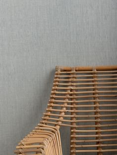 a stack of wooden chairs sitting next to each other