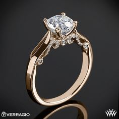 a white gold engagement ring with diamonds on it