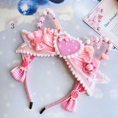 This price is for a KC only, others are not included. Pink Ears Headband Gift, Pink Ears Headband As Gift, Pink Headband With Ears For Gift, Whimsical Pink Headband Gift, Whimsical Pink Headband For Gift, Whimsical Pink Headband For A Gift, Decora Outfits, Decora Accessories, Cutesy Outfits