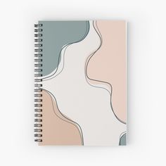 a spiral notebook with an abstract design on the front and back cover, in pastel tones