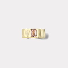 Polished 14k yellow gold with a 1.24ct Emerald Cut Peach Brown Sapphire. Ring is a size 5.5. This ring was handmade in Los Angeles. It is one of a kind and ready for immediate shipping. Luxury Gold Morganite Jewelry, Morganite Ring In Yellow Gold, Heirloom Gold Ring With Morganite, Heirloom Gold Morganite Ring, Morganite Fine Jewelry In Yellow Gold, Heirloom Morganite Gold Ring, Fine Jewelry Emerald Cut Pink Sapphire Ring, Yellow Gold Morganite Jewelry With Center Stone, Heirloom Morganite Jewelry In Yellow Gold