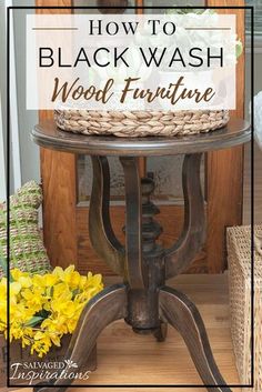 a black wash wood furniture with yellow flowers in the background and text overlay that reads how to black wash wood furniture