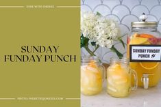 some drinks are sitting in mason jars on a counter with the words sunday funday punch