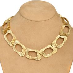 "The perfect way to enhance the look of that special woman.  This Italian estate necklace is crafted in solid 18K yellow gold, this exquisite piece has 13 open links, fancy cushion-shaped, with a stacked textured design finely made in luxurious gold. The complete piece weighs 106.0 grams, and its inner circumference measures approximately 16.5\" x 0.75\" wide, secured with an insert clasp. Hallmark Signed & Purity Marked Remains in Excellent Condition. Matching Bracelet Available SKU # 1086002 A Elegant Luxury Yellow Gold Choker, Luxury Vintage Gold Choker, Luxury Yellow Gold Choker With Adjustable Chain, Italian Estate, Fancy Cushions, Crescent Earrings, 18k Gold Bracelet, Gem Diamonds, Jewelry Appraisal