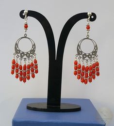 "♥ Meticulously handcrafted earrings made from precious Mediterranean coral. The coral is unique, all natural and hasn't been treated or dyed in any way. Earrings are based on a silver wire, around filigree centerpiece. Design of the filigree pattern, is inspired by traditional, Croatian filigree jewelry. Everything is handmade from solid sterling silver 925. ♥ Total dimensions: ~ 6.9 x 2 cm ( 2.71 x 0.79\" ) ◎ Enter the shop, for more of our jewelry, and matching necklace ;) ◎ - - - - - - - - - Red Coral Earrings, Silver Chandelier, Filigree Pattern, Filigree Jewelry, Coral Earrings, Filigree Earrings, Coral Jewelry, Long Red, Handcrafted Earrings