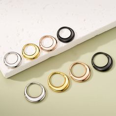 This is a stunning and unique piece of jewelry that adds a touch of elegance and sophistication to any outfit. The chic yet bold style of this hinged segment thick septum ring is enhanced by its smooth and seamless construction, providing a comfortable and secure fit. It sits snugly against the skin, preventing snagging or pulling on clothing or hair. Ring Day, Purple Flame, Halloween Ring, Black And Rose Gold, Fake Nose Rings, Daith Earrings, Dangle Belly Rings, Fake Nose, Labret Studs