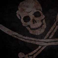 a skull and crossbones on a black background with the word pirates written in white