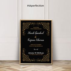 an elegant black and gold wedding card