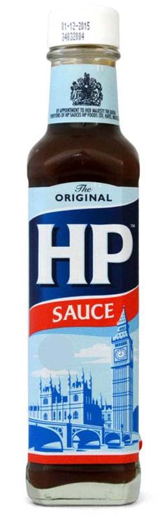 a bottle of sauce that is sitting on a white surface with the word hp in it